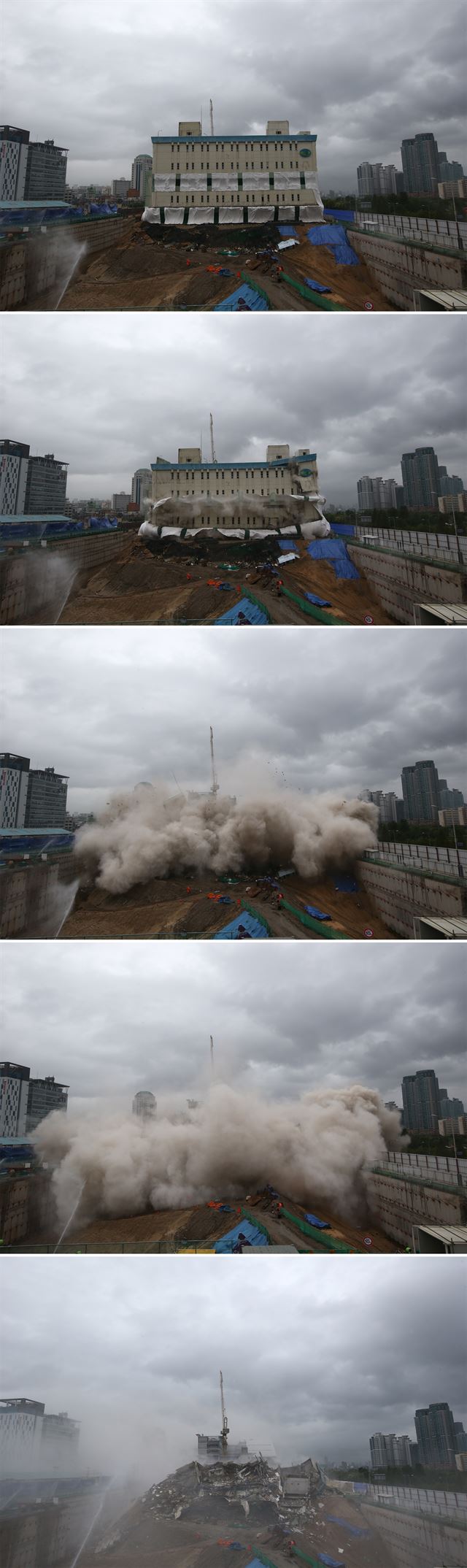 노량진 수산시장 현대화 사업에 따라 10일 오후 서울 노량진 수산시장 내 냉동창고 건물 발파해체 작업이 진행됐다. 이번 철거작업에는 다이너마이트 41㎏과 뇌관 800개를 투입, 기둥을 순차적으로 무너뜨려 불균형 상태로 만든 뒤 구조물이 스스로 붕괴하도록 하는 발파해체 공법이 이용됐다. 사진은 철거 과정의 모습을 한 장의 사진으로 합성한 모습. 엲바뉴스