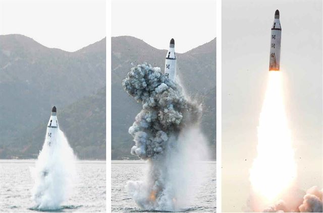 북한이 23일 "대성공했다"고 주장하며 공개한 잠수함발사 탄도미사일(SLBM)의 수중발사 시험 모습. 연합뉴스