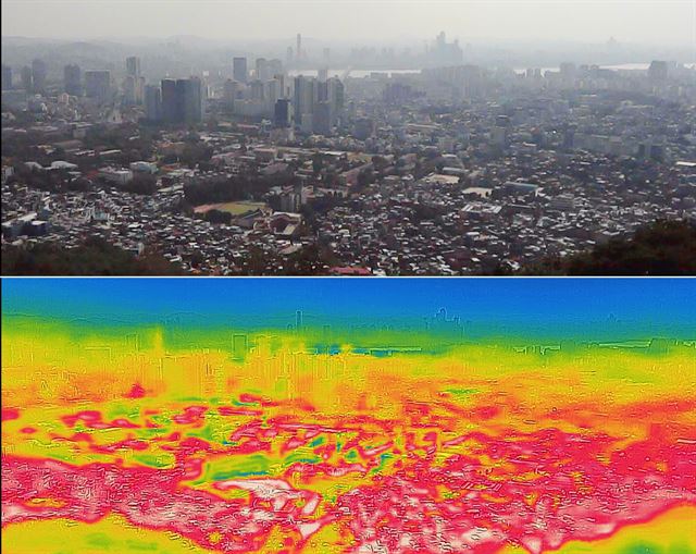 1907년 기상관측 이래 역대 최고 기온을 기록한 1일 오후 서울 남산에서 일반 카메라와 열화상 카메라로 촬영한 도심의 모습. 아래쪽 영상이 열화상 카메라로 찍은 사진으로 온도가 높을수록 붉게 낮을수록 푸르게 표시된다. 연합뉴스