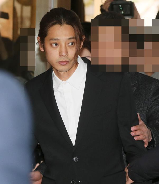 정준영이 21일 영장실질심사에 출석하면서 사과문을 낭독했다. 사진은 지난 14일 정준영이 경찰에 출석할 당시의 모습이다. 추진혁 기자