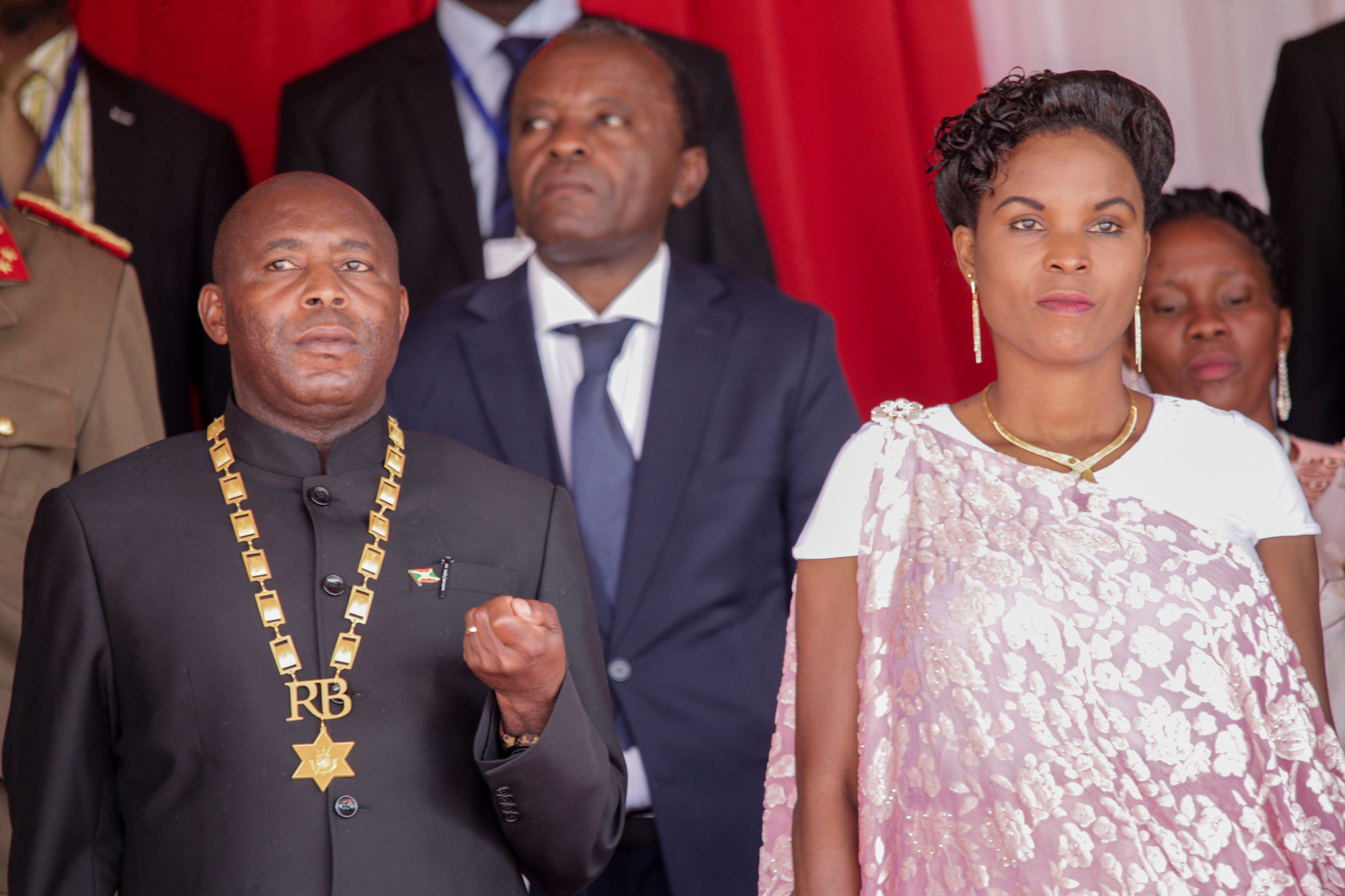 (200619) -- GITEGA, June 19, 2020 (Xinhua) -- Burundian new President Evariste Ndayishimiye (L) attends his swearing-in ceremony in Gitega, Burundi, on June 18, 2020. Burundi's president-elect Evariste Ndayishimiye, who won the May 20 presidential poll, was on Thursday sworn in in the political capital Gitega in central Burundi. (Photo by Evrard Ngendakumana/Xinhua)/2020-06-19 15:51:14/