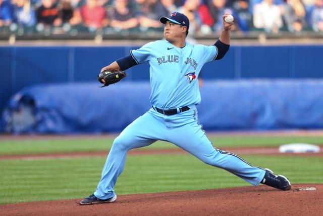 Toronto Blue Jays starter Hyun Jin Ryu throws a pitch during the first inning of the teams baseball game against the Houston Astros in Buffalo, N.Y., Friday, June 4, 2021. (AP Photo/Joshua Bessex)