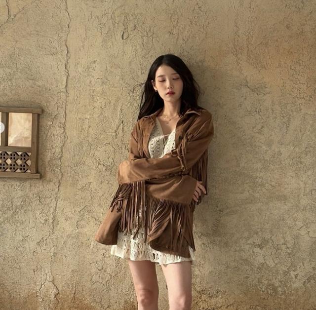 IU’s daily fashion is drawing attention.  Captured from IU's social media