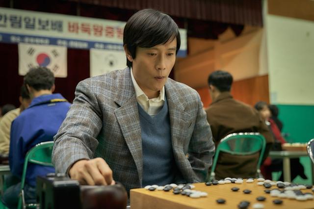 Lee Byung-hun says he focused more on “practicing how to place the go stones” than studying the game itself. Courtesy of By4M Studio