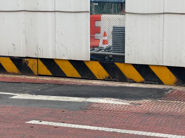 A sinkhole caused by high temperatures in Dongdaemun District, Seoul, newly paved over on July 27. Hankook Ilbo