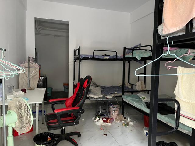Inside the Taizi compound in Takeo Province, Cambodia, on Thursday. Rows of bunk beds and abandoned rooms show traces of a hurried escape. Hankook Ilbo