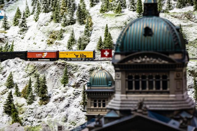 Model trains run at the Swiss Pavilion of Nowon Train Village in Seoul. Hankook Ilbo
