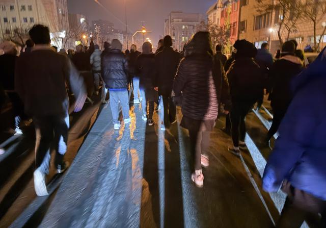 Protesters march in the streets of Tehran, Jan. 8.  AP-Yonhap