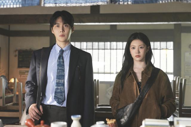 Ho-jin, left, helps Mu-hee as her interpreter in “Can This Love Be Translated?” Courtesy of Netflix
