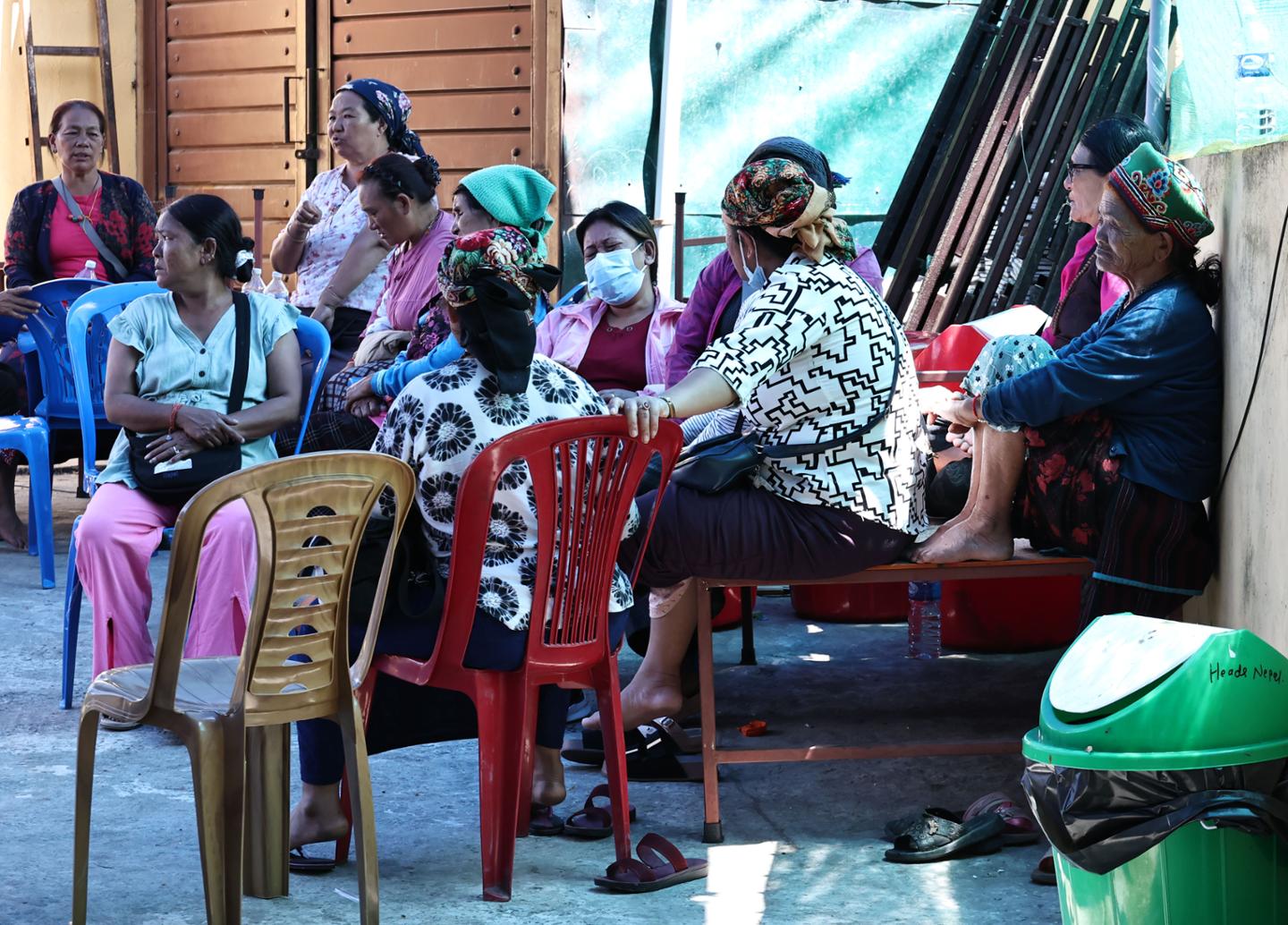 Displaced residents from Rasuwa and Nuwakot sit at a temporary shelter for flood victims at the Kunsang Choeling Monastery in Kathmandu, Nepal, Sept. 10. Yonhap 